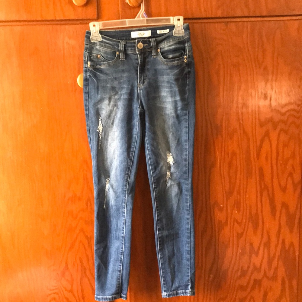 Dark wash, mid rise jeans. For girls